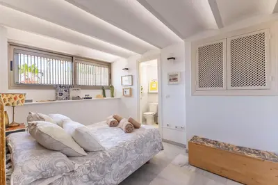 Zona de estar de Charming 2 Bedroom Boutique Triplex Apartment with Private Terrace at Seville City Center by OCityzen