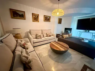 Zona de estar de Carmen Home
