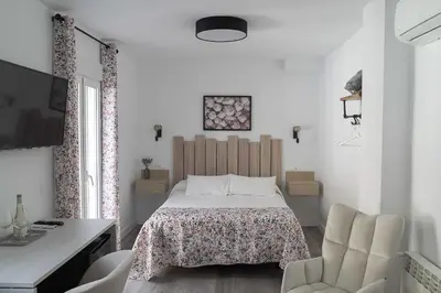 Cama o camas de una habitación en Casa Rural Las Cuevas de Setenil
