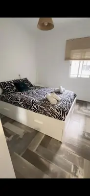 Cama o camas de una habitación en Lovely Rooms en piso compartido