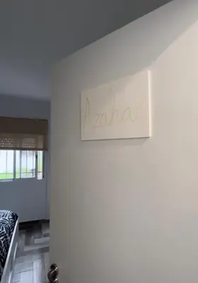 Zona de estar de Lovely Rooms en piso compartido