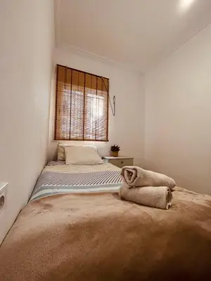 Cama o camas de una habitación en Lovely Rooms en piso compartido