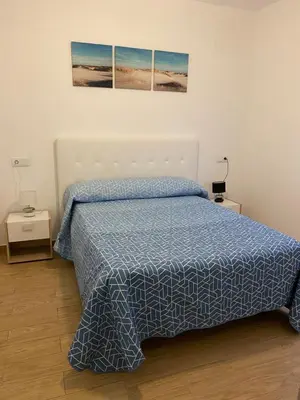 Cama o camas de una habitación en El Olivo