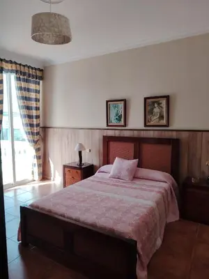 Cama o camas de una habitación en Villa Santa Ana