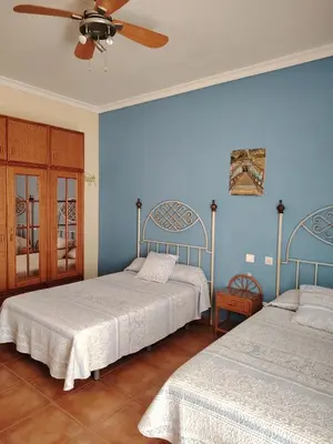 Cama o camas de una habitación en Villa Santa Ana