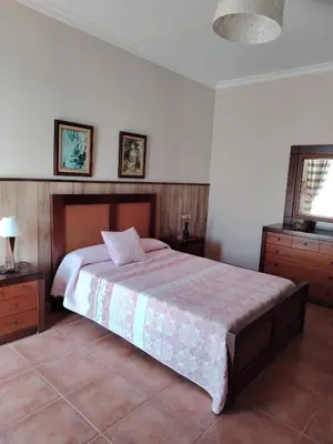 Cama o camas de una habitación en Villa Santa Ana
