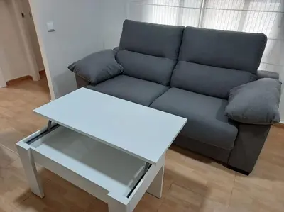 Zona de estar de Piso de diseño en el centro de Córdoba by beBalmy