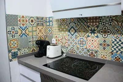 Una cocina o zona de cocina en Espectacular loft reformado en Córdoba by beBalmy