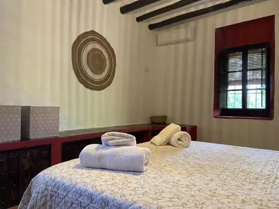 Cama o camas de una habitación en Cortijo La Cañada