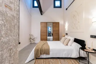 Cama o camas de una habitación en Loft Suite Frutos