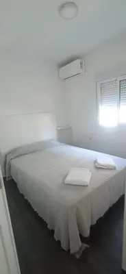 Cama o camas de una habitación en Savio apartamento