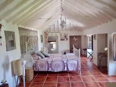 Cama o camas de una habitación en Hacienda la Suerte