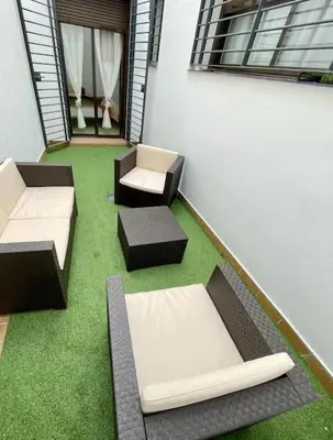 Zona de estar de Coqueto apartamento en el centro de Sevilla con patio privado
