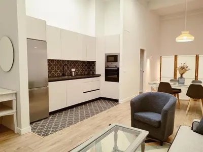 Una cocina o zona de cocina en NUEVO RIBERA Arcangel Suite