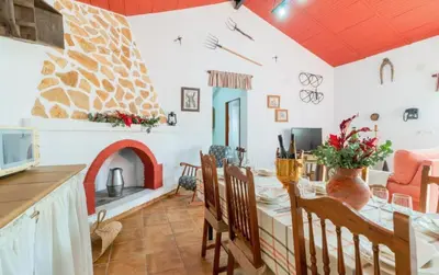Zona de estar de Casa Rural Camino de los molinos y su establo