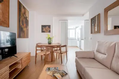 Una televisión o centro de entretenimiento en Magno Apartments González Cuadrado