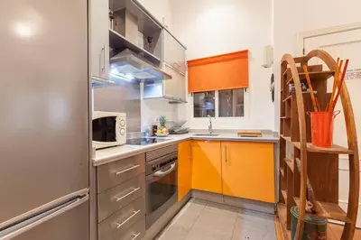 Una cocina o zona de cocina en Estudio Espacioso y Céntrico Sevilla
