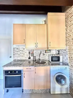 Una cocina o zona de cocina en Hispalis parroquia de San Julián