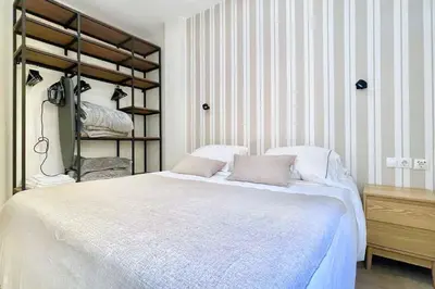 Cama o camas de una habitación en San Marcos Sevilla Center