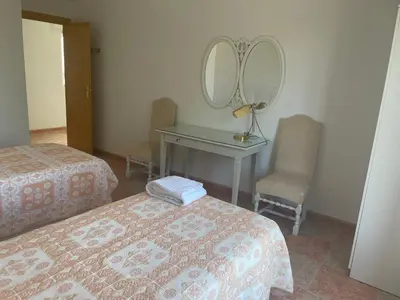 Cama o camas de una habitación en Apartamento El Mirador de Sierra Mágina II Noalejo entre Granada y Jaén