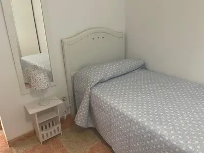 Cama o camas de una habitación en Apartamento El Mirador de Sierra Mágina II Noalejo entre Granada y Jaén
