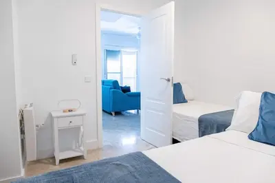 Cama o camas de una habitación en Alohamundi Santa Marina