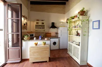 Una cocina o zona de cocina en Hosfty Centro - Mirador San Marcos 1