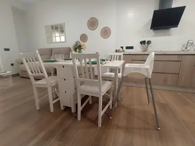 Una televisión o centro de entretenimiento en Apartamento nuevo céntrico con Aparcamiento privado Incluido