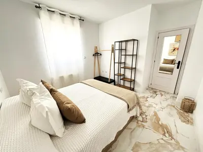 Cama o camas de una habitación en Vivienda turística Jaén Interior ÁTICO