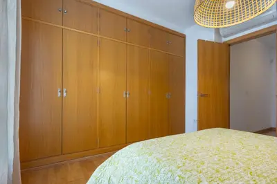 Cama o camas de una habitación en Duplex Moderno Alameda Hercules
