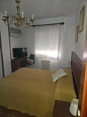 Cama o camas de una habitación en Apartamento Gabucio en Jaén