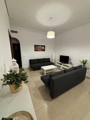 Zona de estar de Sultana Homes