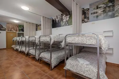 Cama o camas de una habitación en Hostal Entrecaminos