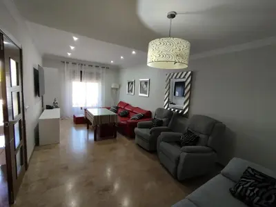 Zona de estar de Adosado Centro Urbano 3 Dorm Patio Terraza Wi-fi Puente Genil 1-6 Huésped