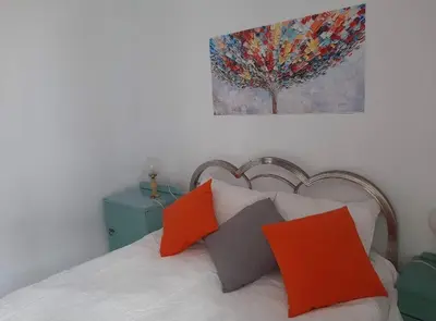 Cama o camas de una habitación en La madrileña