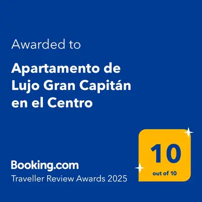 Certificado, premio, señal o documento que está expuesto en Apartamento de Lujo Gran Capitán en el Centro