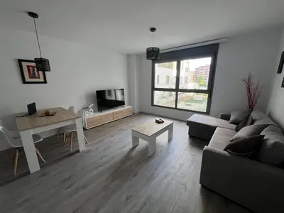 Una televisión o centro de entretenimiento en Apartamento de Lujo Gran Capitán en el Centro