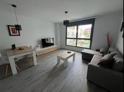 Una televisión o centro de entretenimiento en Apartamento de Lujo Gran Capitán en el Centro