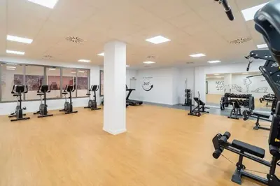Gimnasio o instalaciones de fitness de Apartamento de Lujo Gran Capitán en el Centro