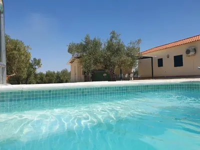 Piscina en o cerca de El Algar Casa Rural