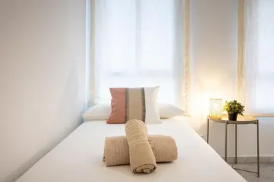 Cama o camas de una habitación en La Florida Charming Apartment with FREE PARKING by OCityzen