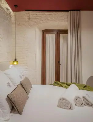 Cama o camas de una habitación en LIRIUM Casa Patio