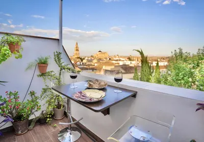 Un balcón o terraza de Ático La Muralla con terraza privada