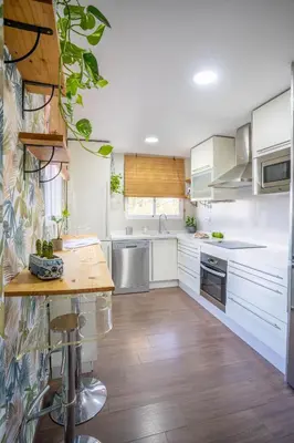 Una cocina o zona de cocina en Ático La Muralla con terraza privada