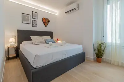 Cama o camas de una habitación en Oasis Cordoba Central