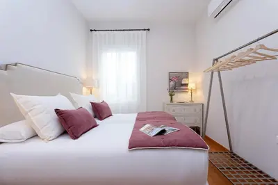 Cama o camas de una habitación en Genteel Home Manuel de Sandoval