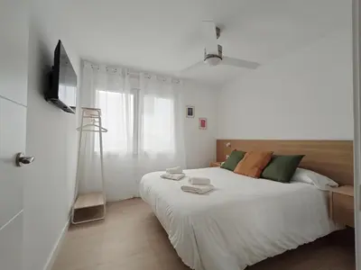 Cama o camas de una habitación en Apartamento Plaza Pineda