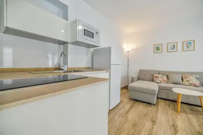 Una cocina o zona de cocina en Apartamentos Deanes & Casco histórico