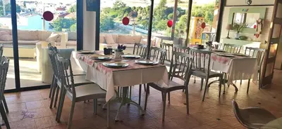 Un restaurante o sitio para comer en Hotel Campos de Baeza