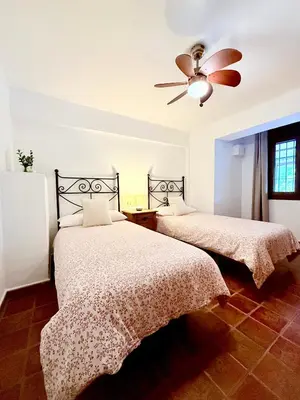 Cama o camas de una habitación en Casa Rural Orilla del Hueznar